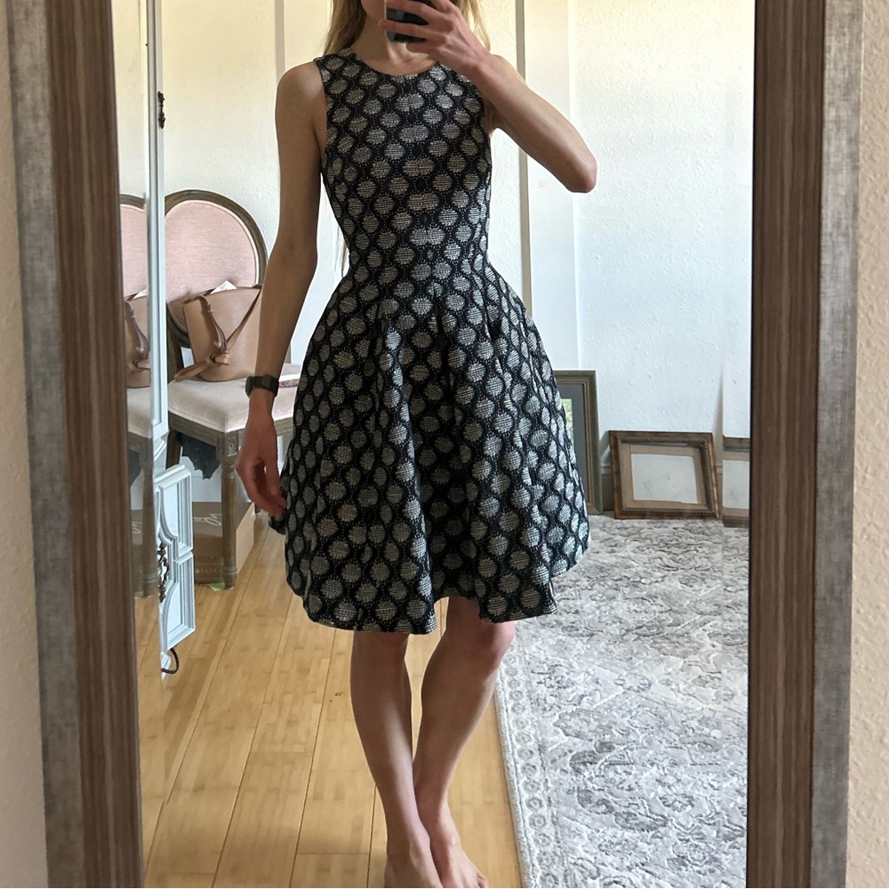 Black and gray dress with full skirt and raceback back with zipper